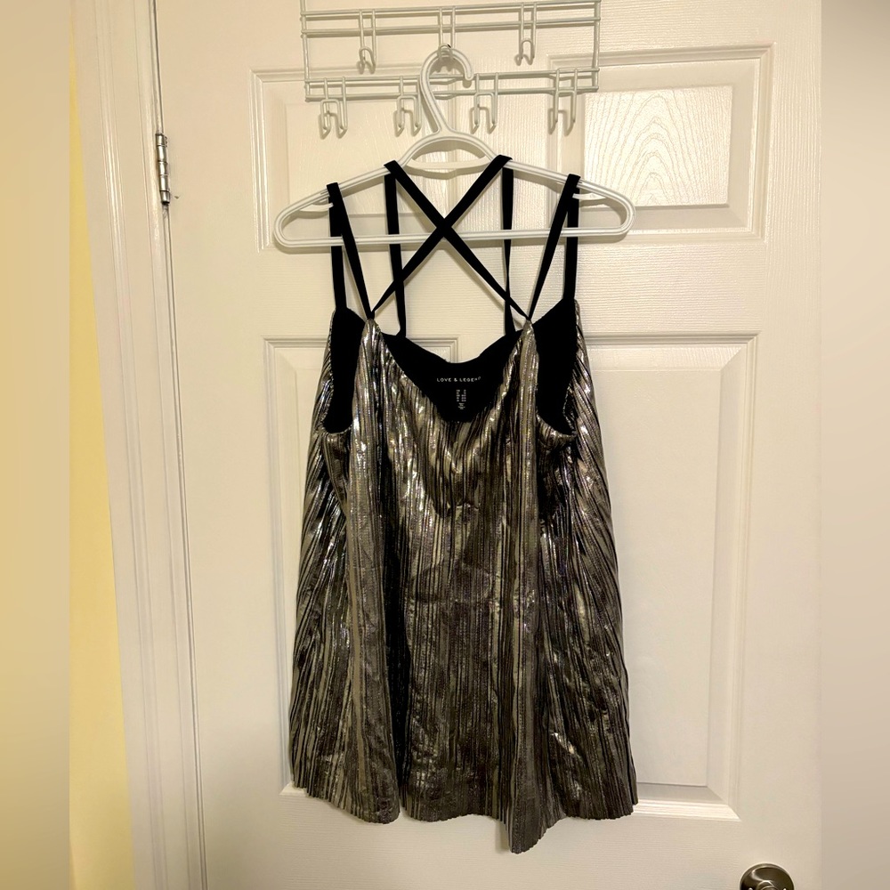 Silver, flowy, thin straps, pleated top. Great for holiday parties!